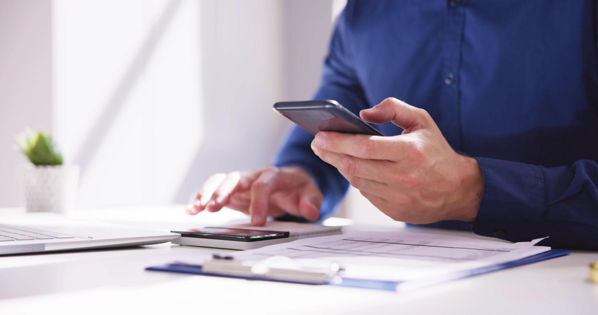 Employee using mobile AI-powered expense management in Dynamics 365 Business Central, showing automated receipt processing, expense reporting, and finance workflow automation inside the ERP system.